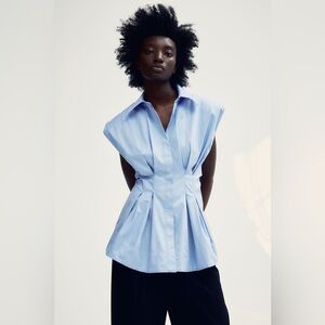 H&M sleeveless waisted shirt with shoulder pads